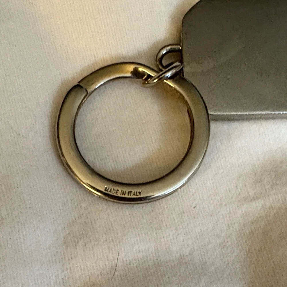 Black leather gg embossed guccissima Silver Keychain mens or womens as is